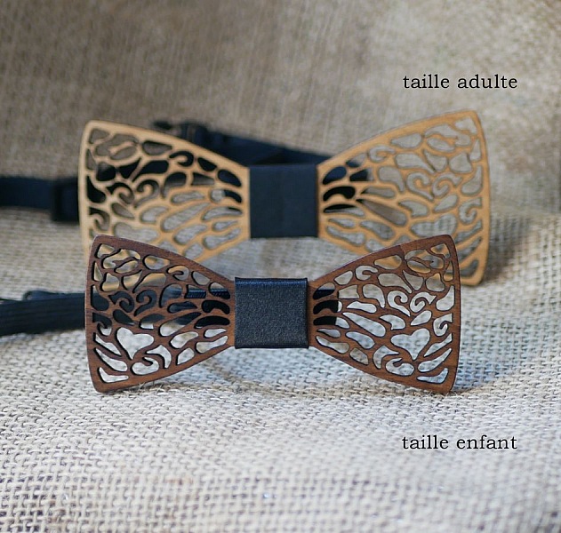 Fluga i tr&auml; med fin spets och dolt hj&auml;rta